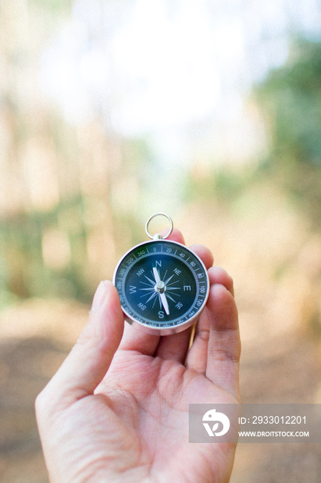 compass in hand