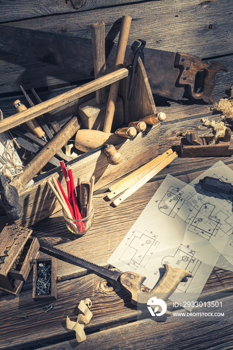 Drawing desk in carpenter workshop in rustic wooden shed
