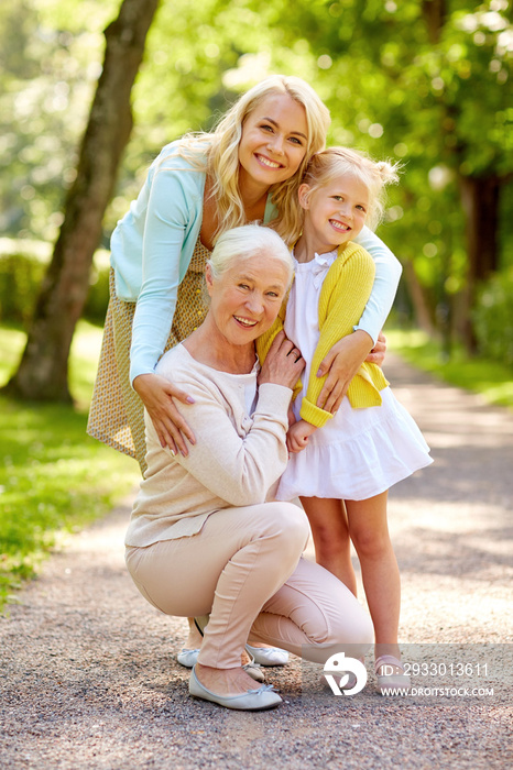 happy mother, daughter and grandmother at park