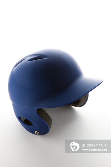 A blue baseball helmet used by children.