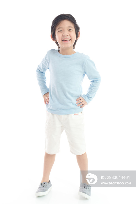 Asian child  in blue t-shirt  standing on white background