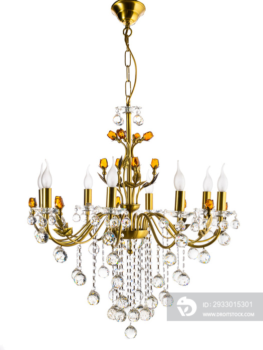 yellow gold chandelier with decorations hanging on a white background