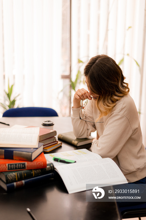 Girl studying on a desk