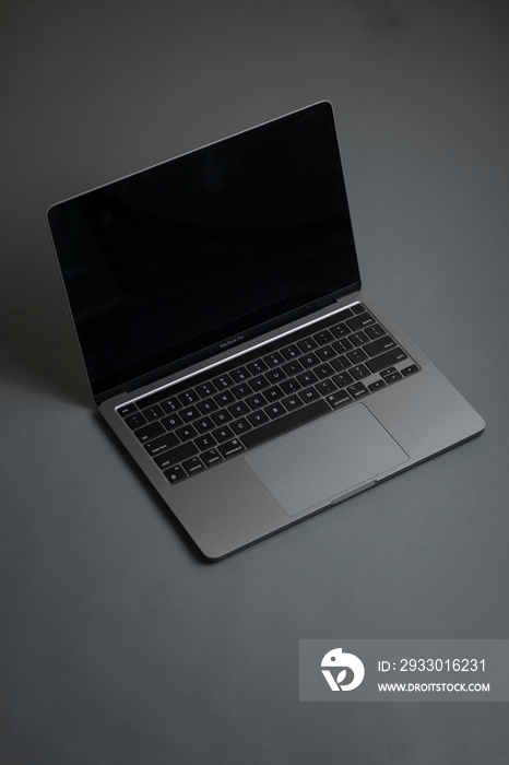 Grey laptop on Grey background