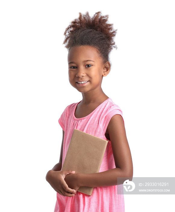 Little African-American girl with book on white background