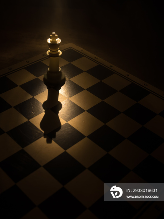 chess board game for ideas and competition and strategy, business success concept. Chess figures on dark