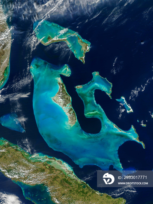 Top view of the Bahamas Islands, Florida, Great Bahama Bank, Andros Island, Atlantic Ocean, Aerial view of ocean waters glow turqouise blue, underwater terrain.Elements of this image furnished by NASA