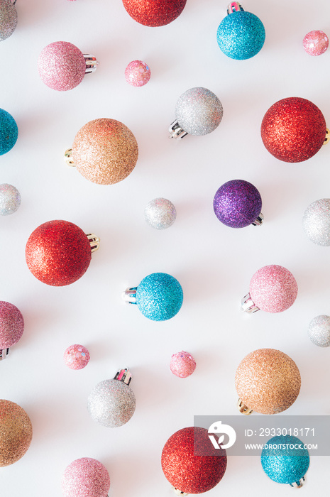 Christmas background pattern made of Christmas baubles. Colorful Christmas balls. New year flat lay holiday concept