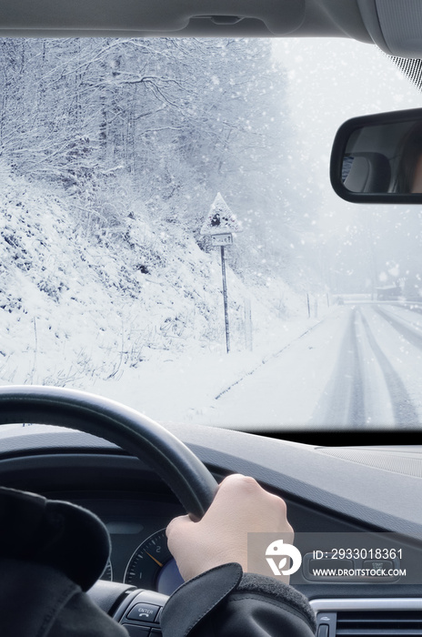 Winter Driving - Driving on a snowy mountain road