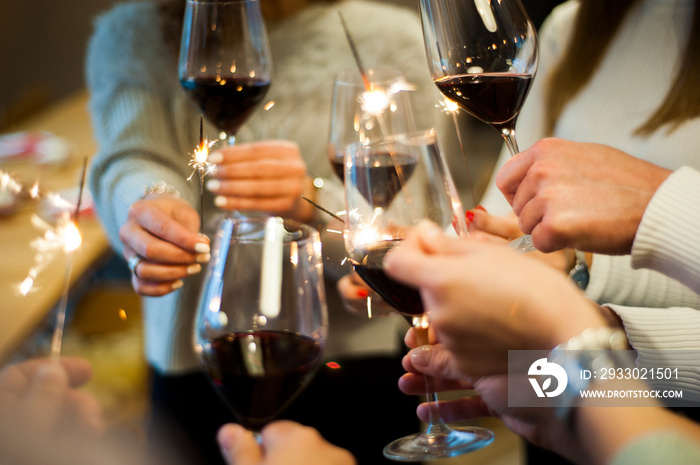 Friends celebrate their birthday at the local winery. Elegant glasses with homemade quality wine