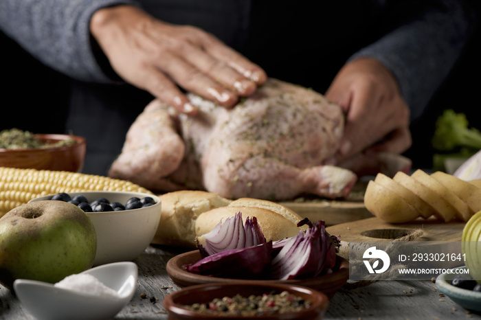 young man preparing a turkey