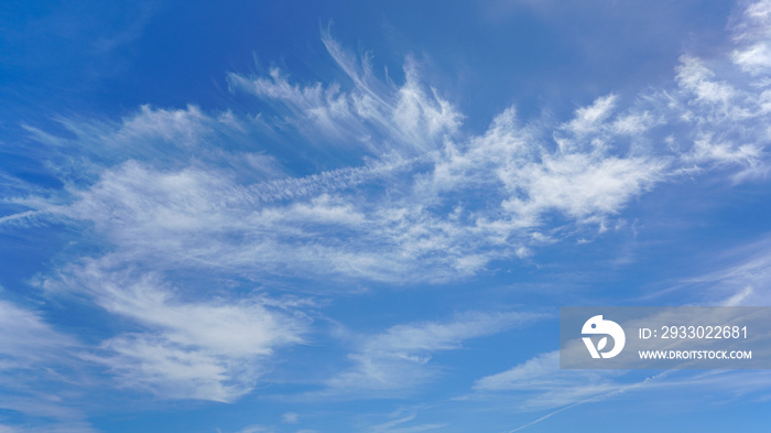 WIspy clouds and blue sky suitable for background or sky replacement