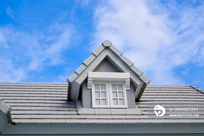 White Roof house and window and blue sky with cloud