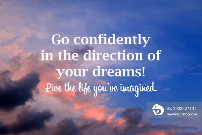 Inspirational motivational quote - Go confidently in the direction of your dreams. Live the life you have imagined. Positive message on bright blurry blue sky clouds at sunset background.