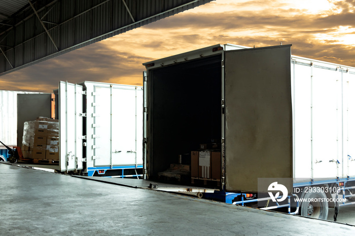 Cargo Container Trucks Parked Loading at Dock Warehouse. Shipment. Packaging Boxes Supply Chain. Distribution Warehouse Shipping . Lorry. Cargo Freight Truck Transport Logistics.