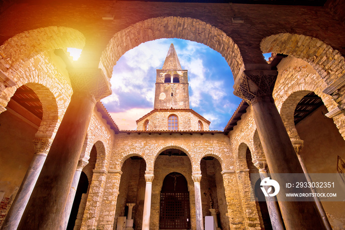 Euphrasian Basilica in Porec arcades and tower sun haze view