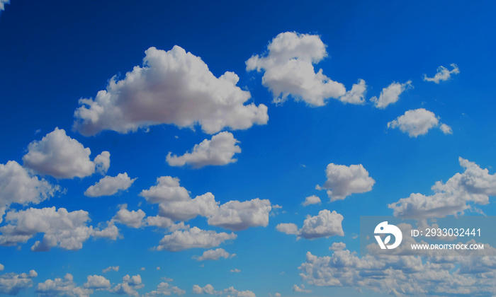 light blue sky with some clouds surface abstract flow thunder white clouds in the blue sky.