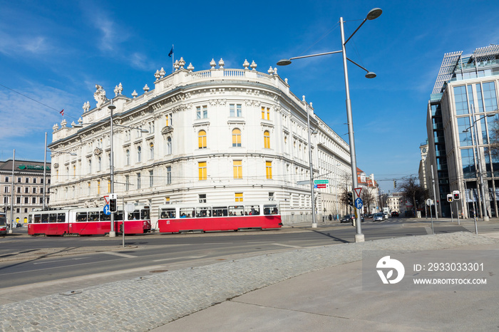 Old red tram in the streets of historic old town of Vienna.