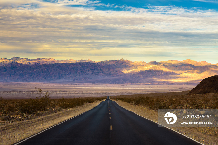 Empty road running through Death Valley