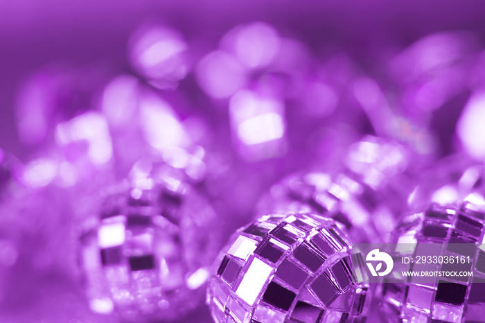 Shiny purple party disco balls background