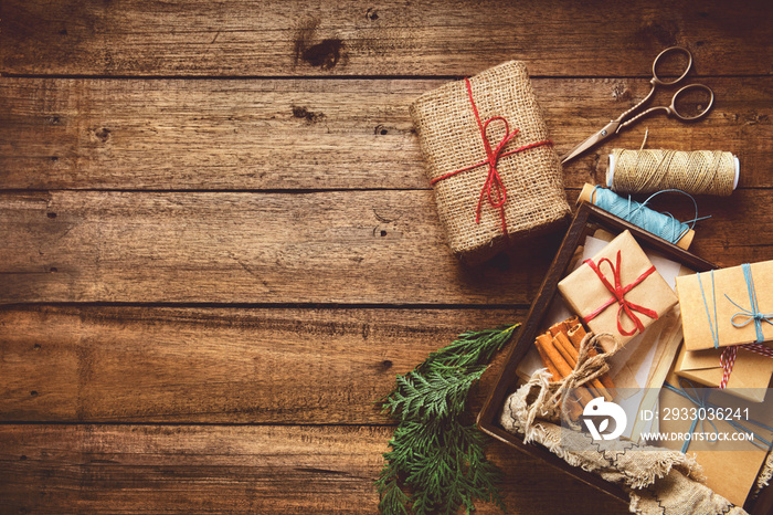 Christmas, New Year composition with gift boxes on wooden table. Preparing for the winter holidays