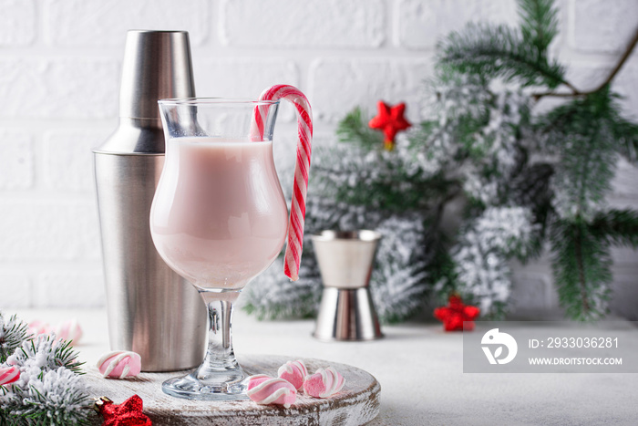 Pink Christmas cocktail with marshmallow