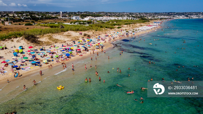 Aerial view of the Pescoluse Beach, aka Maldives of Salento, in the south of Italy - Apulian beach with turquoise waters in summer - Idyllic holiday destination along the Ionian Sea