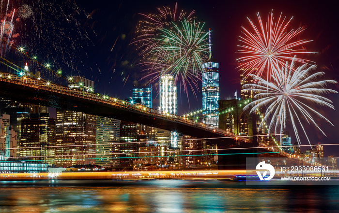 Colorful holiday fireworks panoramic view New York city Manhattan downtown skyline at night