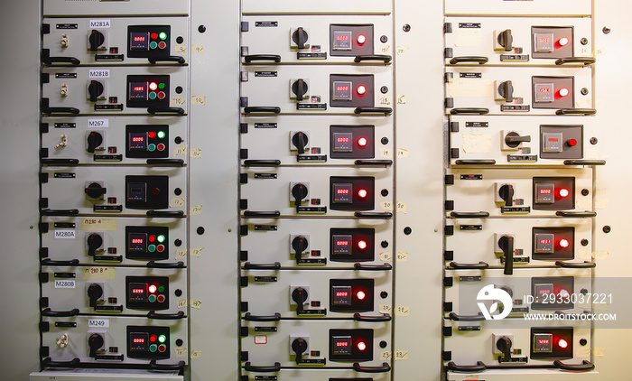 Electrical switch gear at Low Voltage motor control center cabinet  in coal power plant. blurred for background.