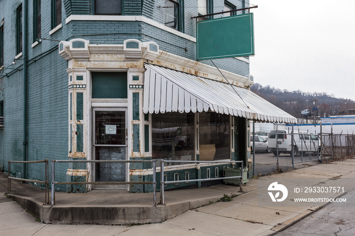 Corner store in old fashioned building with decorative door frame