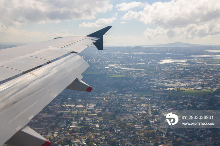 Airplane window view, approach Auckland Airport in Auckland, North Island, New Zealand