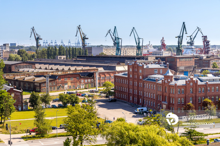 Panoramic view of Gdansk Shipyard industrial infrastructure near European Solidarity Centre building at Solidarnosci square in Gdansk, Poland