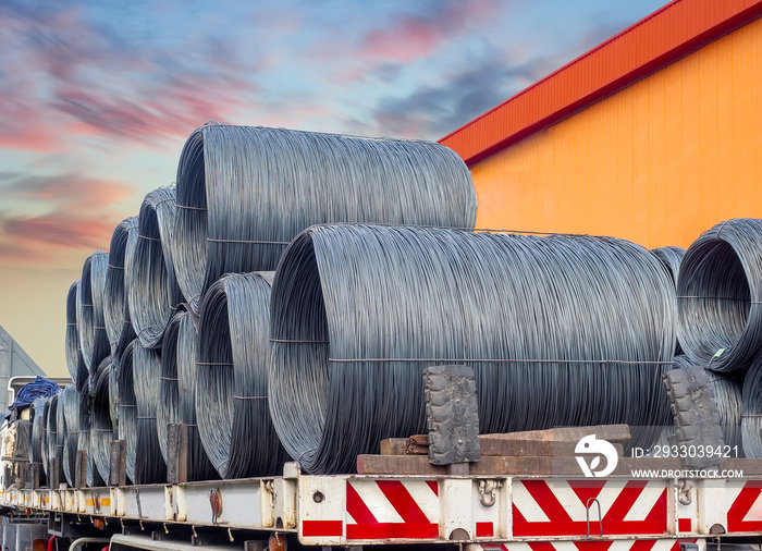 Stacking of wire rod on truck for delivery to  customer. Pile of wire rod or coil on truck for industrial usage .