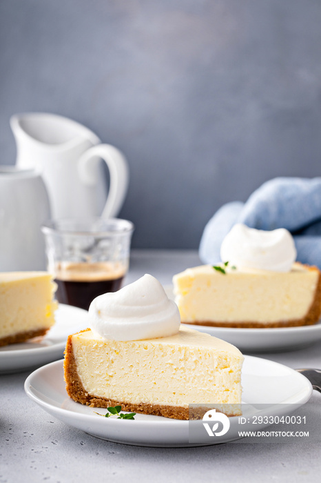 Classic New York cheesecake with a dollop of whipped cream