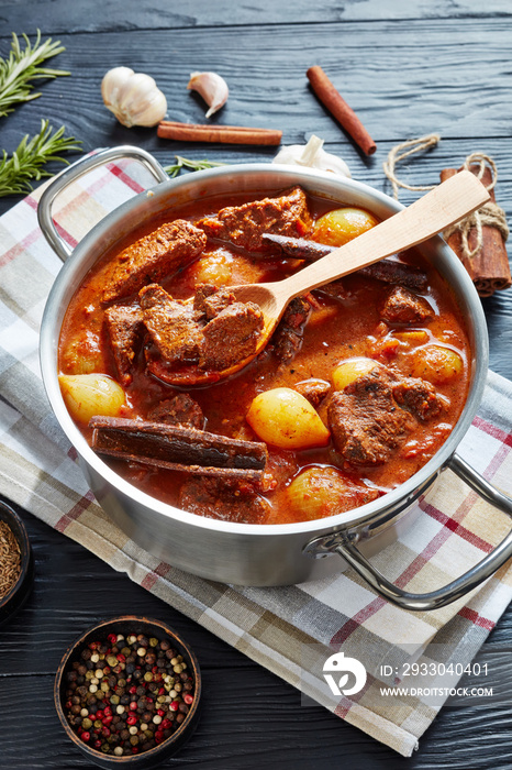 stifado - classic greek stew with beef, onion