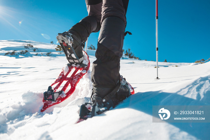 A man in snowshoes.