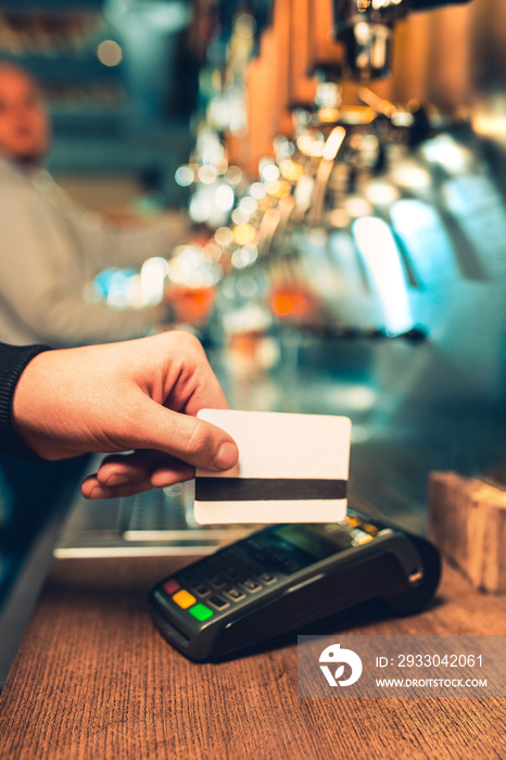 Man using payment terminal