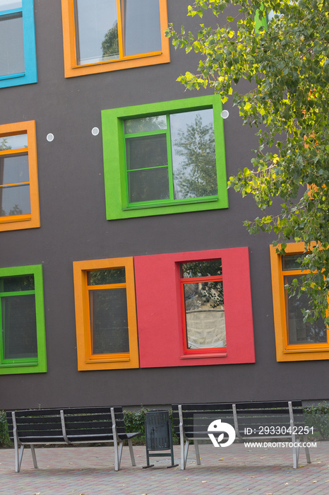 Multi-colored windows of the school in a contemporary style. Architecture