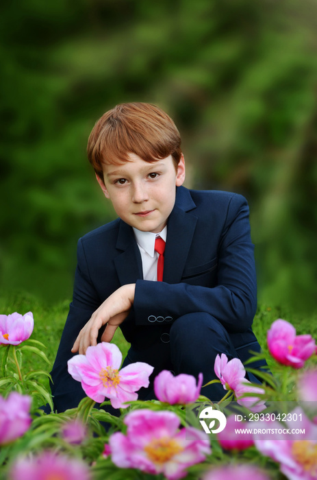 outdoor portrait of boy going to First Holy Communion