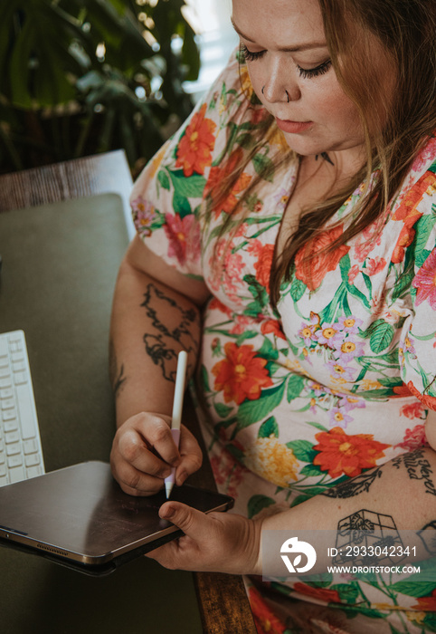 closeup of woman working on tablet