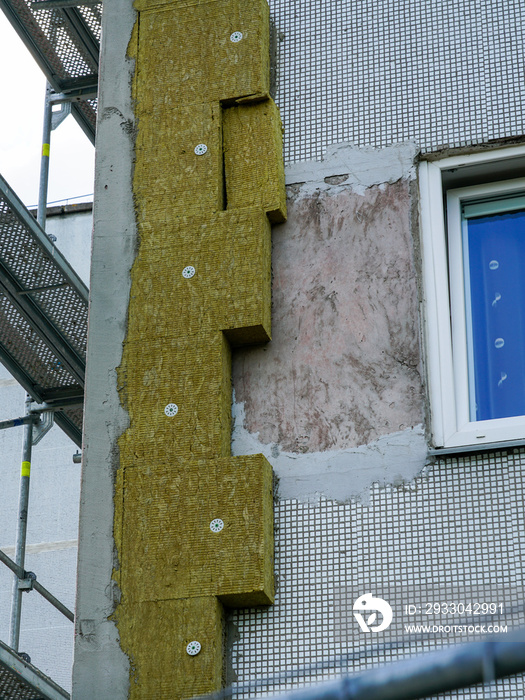 Multistorey apartment house facade cladding with thick mineral rockwool slabs