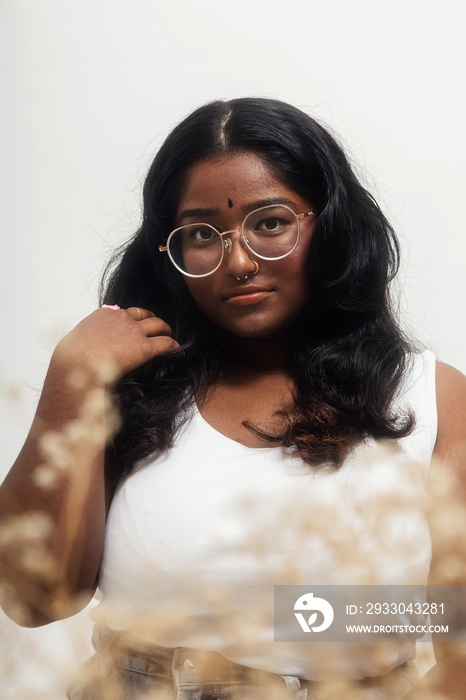 South Asian female solo lifestyle studio portrait shot