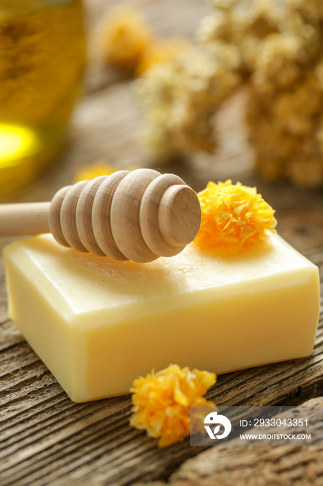 Calendula and honey handmade soap bar, close up. Homemade toxic-free natural organic cosmetic