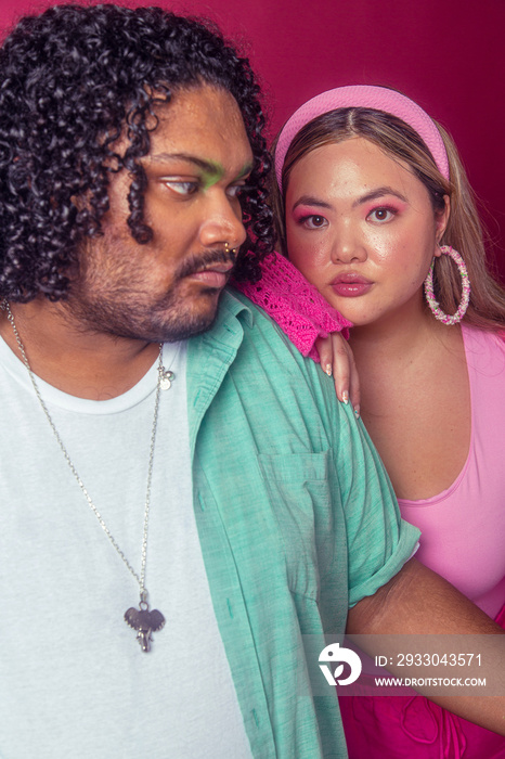 Asian duo fashion colour-blocked studio portrait