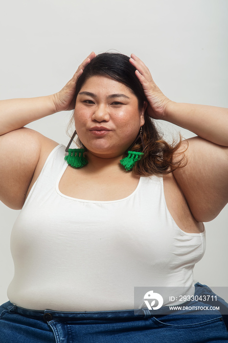 Asian plus size female solo lifestyle studio portrait shot