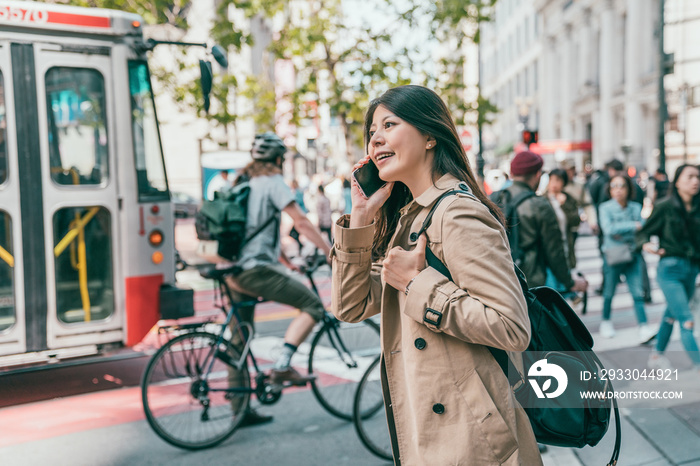 woman talking in phone in busy working day