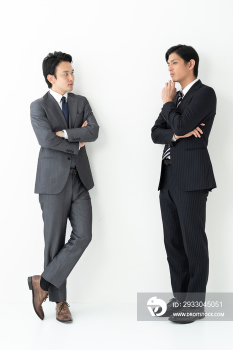 portrait of two asian businessman on white background