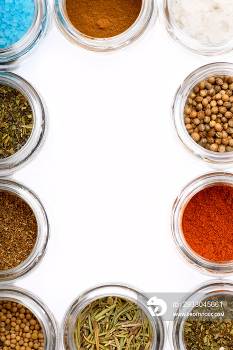 Different spices in bowls on table