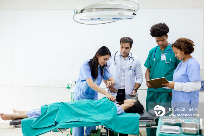 Professional medical teacher give tuition group students in patient operating room. studying classroom university.