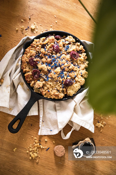 vegan cherry crumble in a skillet